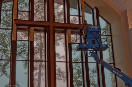 Interior of commons area shows large cross