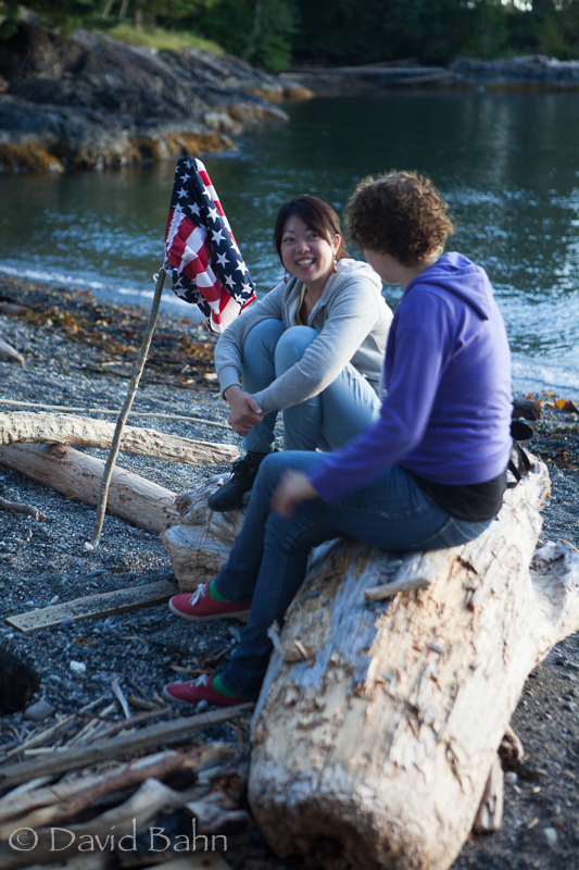 Two of the L'Abri students on the beach on Bowen Island with our star-spangled banner (of sorts).