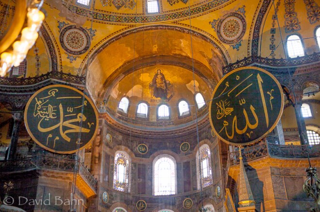 Hagia Sophia in Istanbul, Turkey: Once a Christian church, then an Islamic mosque, it now serves as a museum, where symbols of both Christianity and Islam may be found